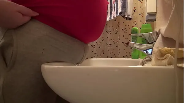 Fresh peeing through gray pants over the sink best Videos